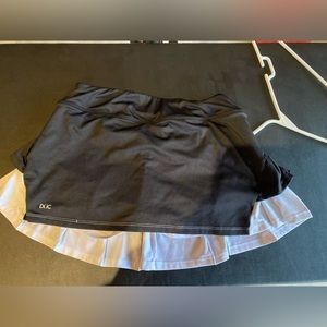 Duc tennis skirt black and white (tennis warehouse)